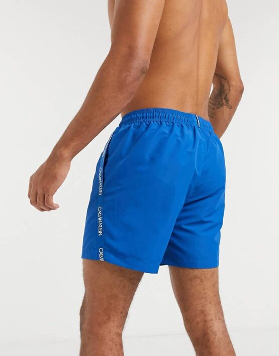Calvin Klein medium length swim trunks in blue - Imagen 2